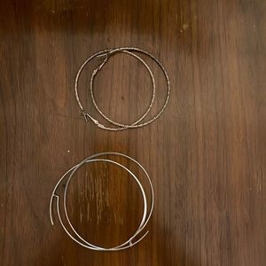 two pair of hoop earrings